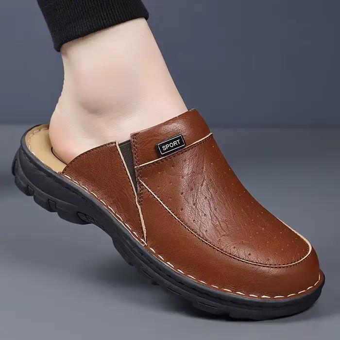 Mules pour hommes à enfiler avec empeigne perforée et panneau latéral élastique pour un port facile
