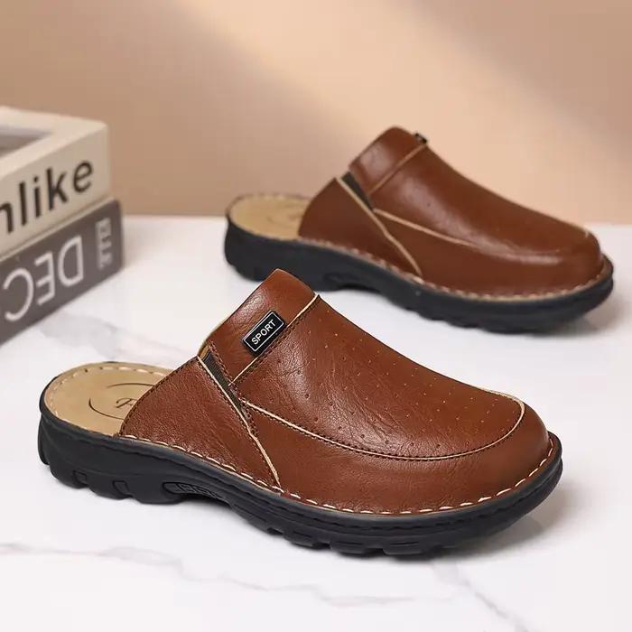 Mules pour hommes à enfiler avec empeigne perforée et panneau latéral élastique pour un port facile