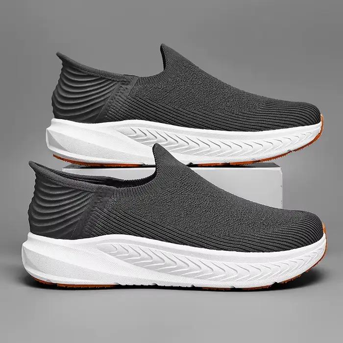 Chaussures de course noires en tricot pour hommes