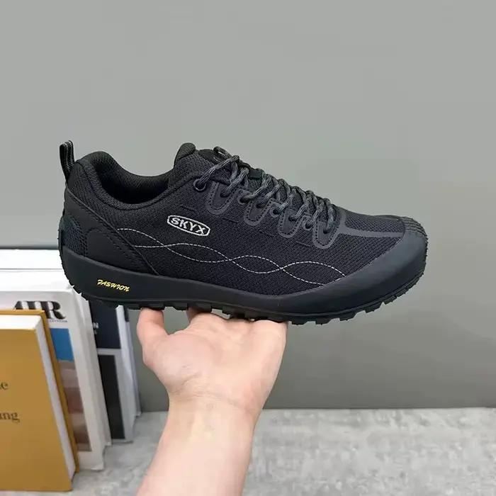 Chaussures de sport en maille noire pour hommes